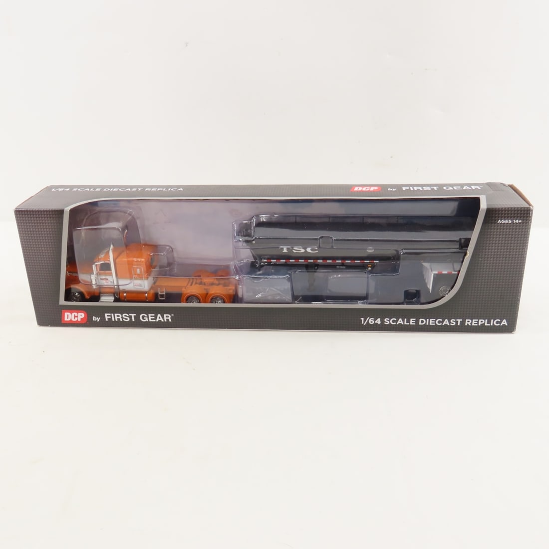 DCP First Gear 1:64 Peterbilt 389 w/Dump Trailer: DCP First Gear 1:64 Peterbilt 389 w/Dump Trailer - SNT Tri-State Commodities 60-0990 1/64 Scale Peterbilt 389 Sleeper with MAC Half Round End Dump Trailer. Lot Size: 16x4x3" 1 lb All information and p