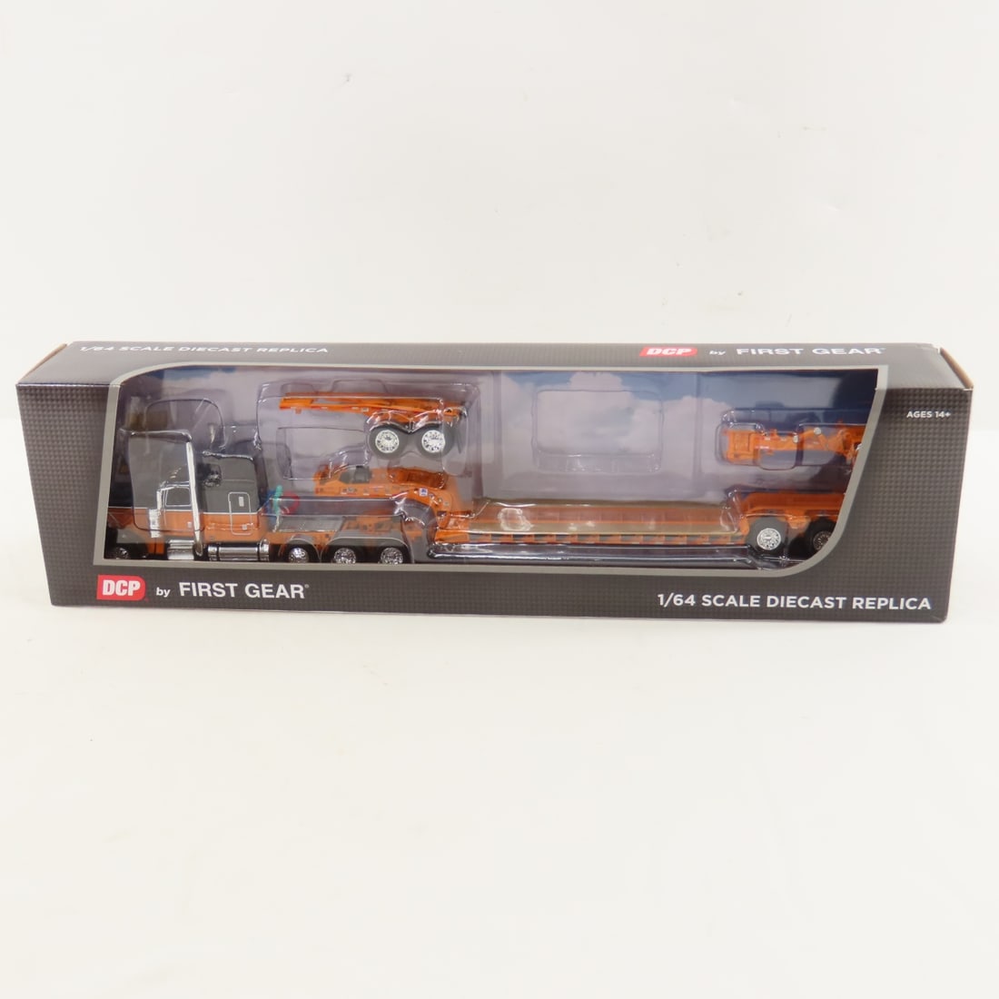 DCP First Gear 1:64 Peterbilt w/Jeep & Stinger: DCP First Gear 1:64 Peterbilt w/Jeep & Stinger - Black/Orange 60-1608 1/64 Scale Peterbilt 389 w/63" Flat Top Sleeper & Fontaine Magnitude w/Jeep & Stinger. Lot Size: 16x4x3" 1 lb All information and