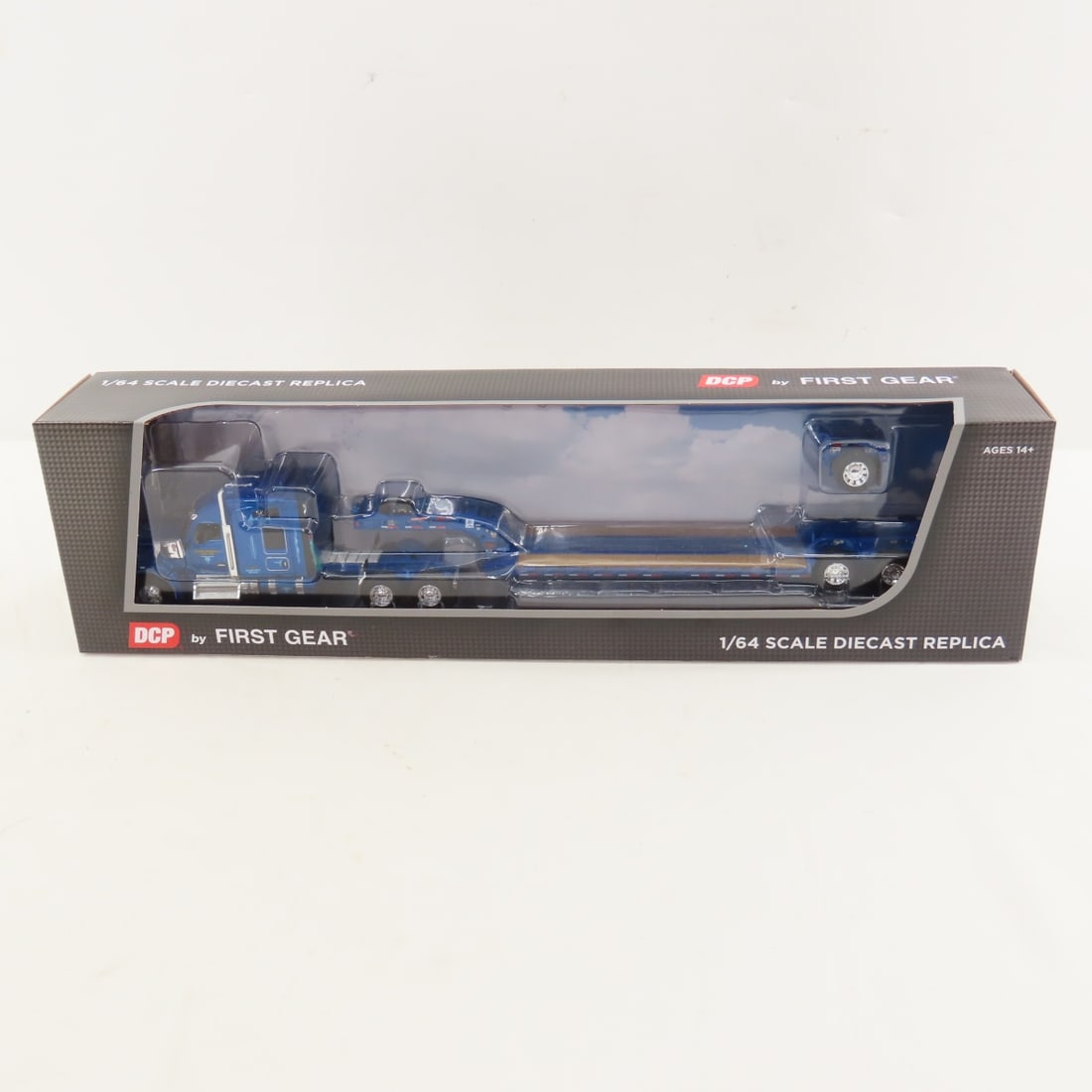 DCP First Gear 1:64 Scale Kenworth W990 Sleeper: DCP First Gear 1:64 Scale Kenworth W990 Sleeper - Western Distributing 60-1723 1/64 Scale Kenworth W990 76" Mid Roof Sleeper and Fontaine Magnitude Lowboy Tri-Axle Trailer with Flip Axle. Lot Size: