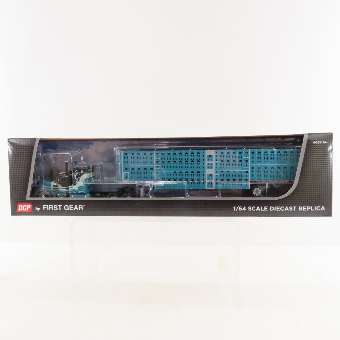 DCP First Gear 1:64 Scale Peterbilt 379 w/Trailer: DCP First Gear 1:64 Scale Peterbilt 379 w/Trailer - DD Desperado 60-1909 1/64Scale Peterbilt 379 63" Mid Roof Sleeper and Wilson Silverstar Livestock Spread Axle Trailer. Lot Size: 16x4x3" 1 lb All