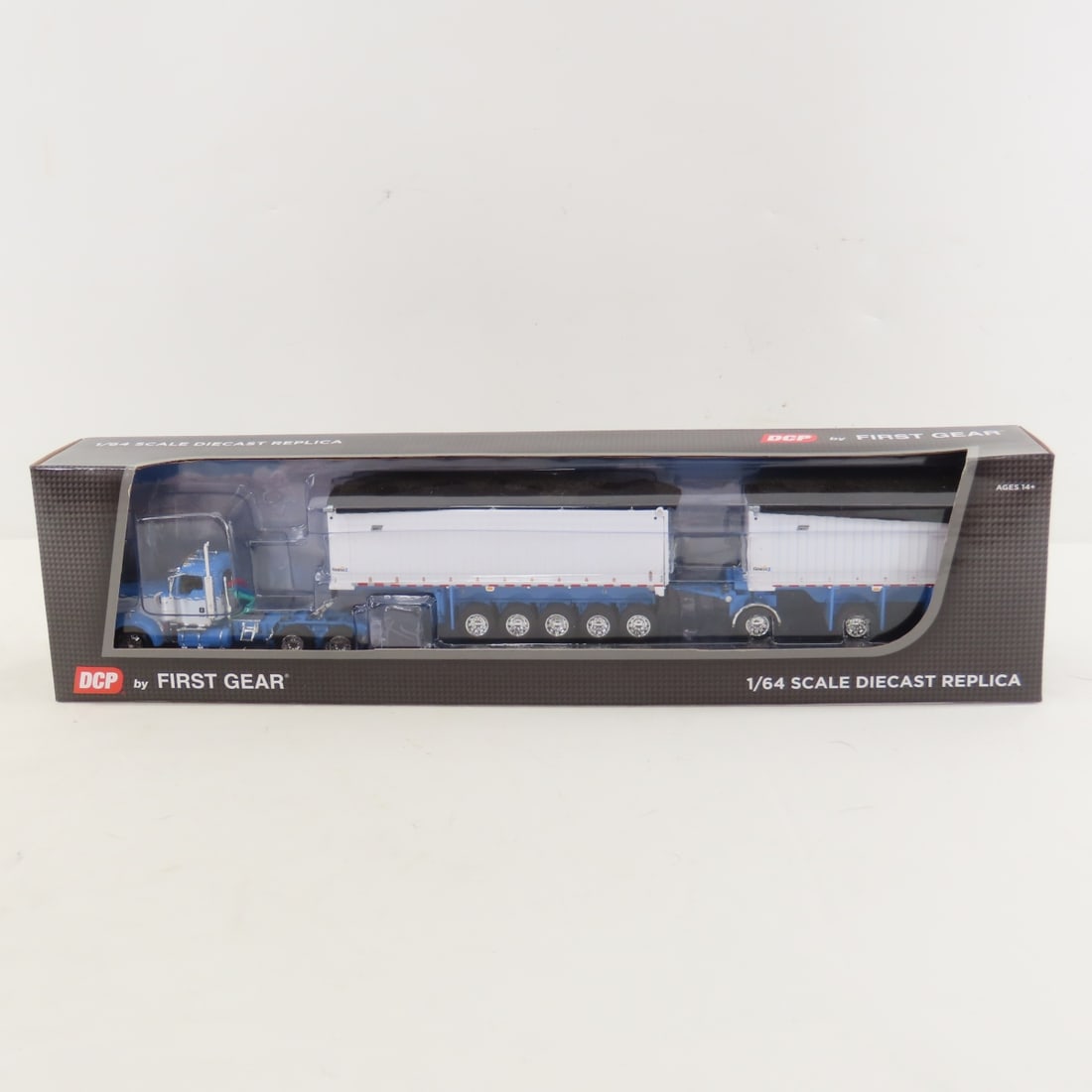 DCP First Gear 1:64 Kenworth W900L w/Dump Trailer: DCP First Gear 1:64 Kenworth W900L w/Dump Trailer - Wisteria White 60-1633 1/64 Kenworth W900L and East Michigan Series 31' + 20' End Dump Trailers. Lot Size: 17x4x3" 1 lb All information and photos a