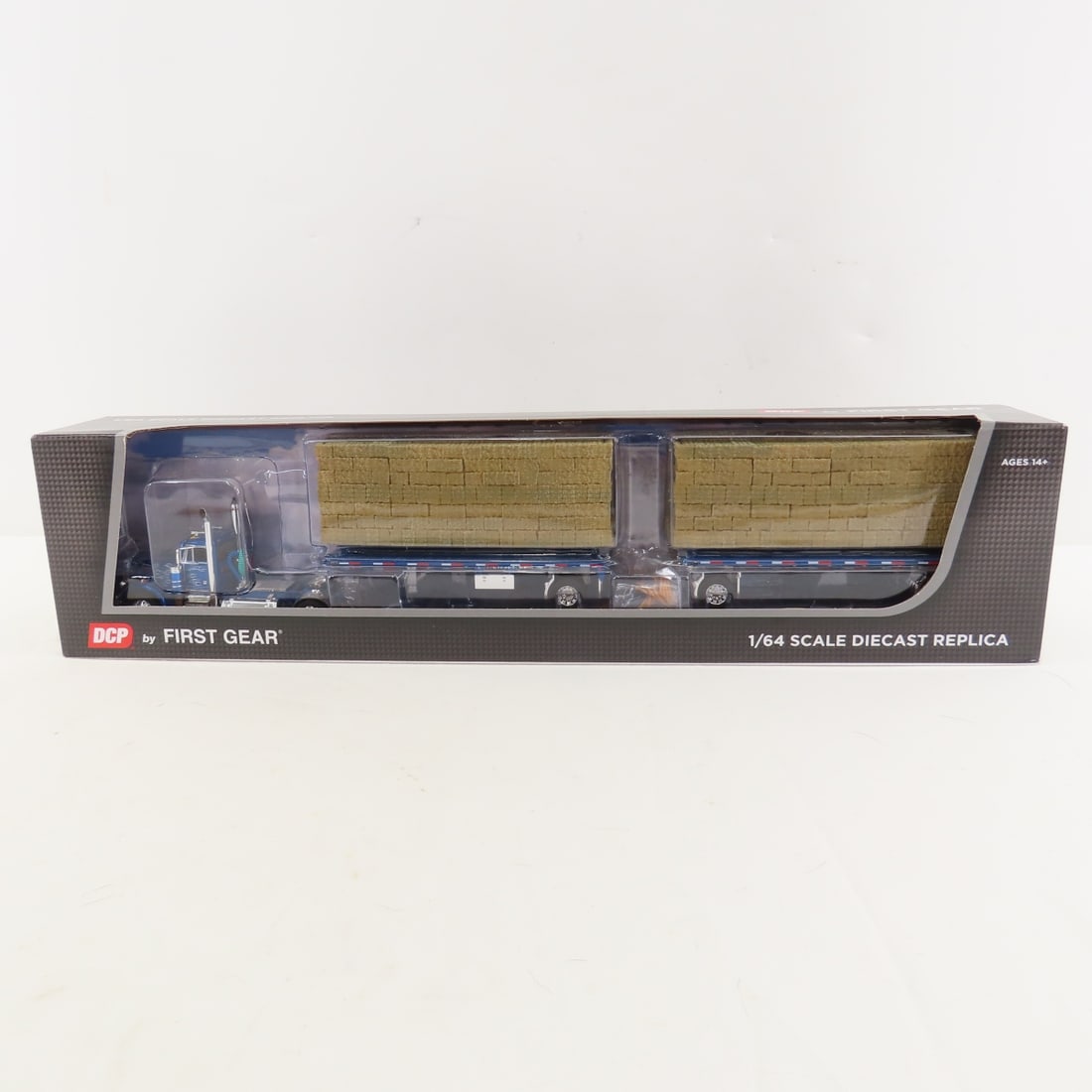 DCP First Gear 1:64 Scale Peterbilt 379 Day Cab: DCP First Gear 1:64 Scale Peterbilt 379 Day Cab - DC Blue/Silver 60-1887 1/64 Scale Peterbilt 379 Single Axle Day Cab and Utility Dual 28.5' Flatbed Trailers with Hay Load. Lot Size: 17x4x3" 1 lb All 