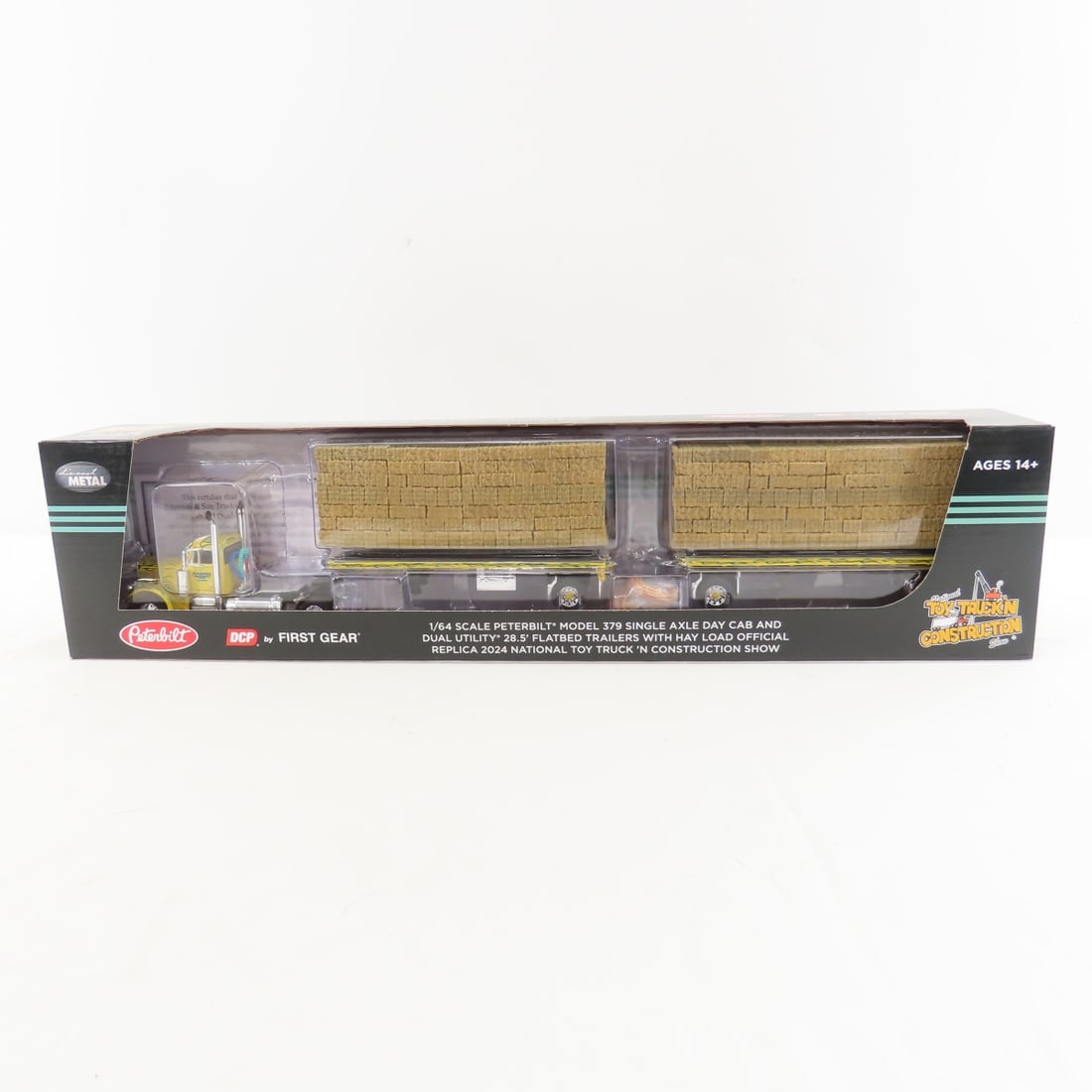 DCP First Gear 1:64 Peterbilt 379 Cab w/Flatbed: DCP First Gear 1:64 Peterbilt 379 Cab w/Flatbed - 1/64 Scale Peterbilt Model 379 Single Axle Day Cab and Dual Utility 28.5' Flatbed Trailers with Hay Load Official Replica 2024 National Toy Truck 'N