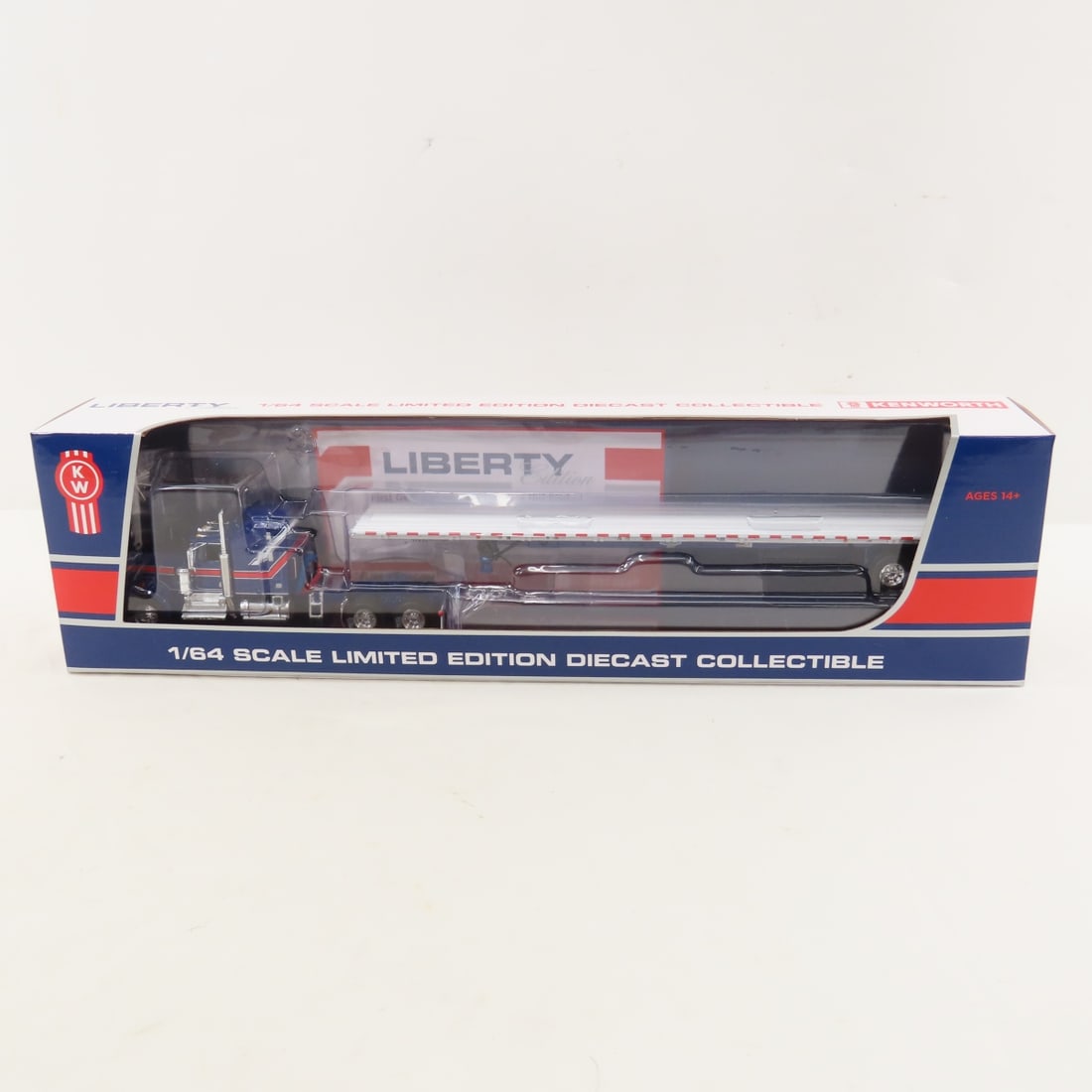 DCP First Gear 1:64 Kenworth Aerodyne Sleeper: DCP First Gear 1:64 Kenworth Aerodyne Sleeper - Liberty 69-1656 1/64 Kenworth W900A Aerodyne Sleeper and Wilson Flatbed Trailer. Lot Size: 16x4x3" 1 lb All information and photos are intended to be