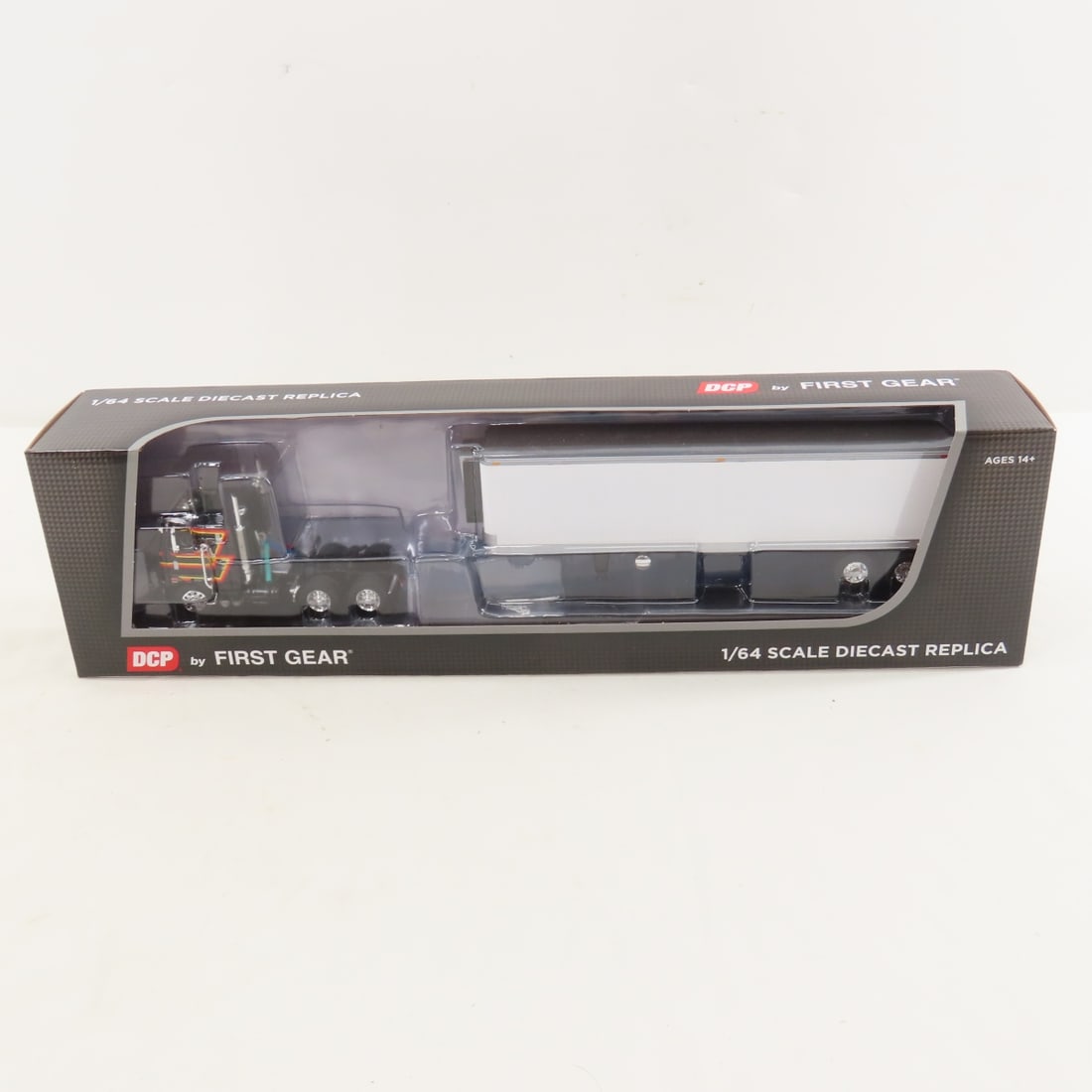 DCP First Gear 1:64 Peterbilt 352 Sleeper & Reefer: DCP First Gear 1:64 Peterbilt 352 Sleeper & Reefer - Black/White 60-2156 1/64 Scale Peterbilt Model 352 COE 86" Sleeper & Vintage 40' Refrigerated Trailer w/Thermo King Reefer. Lot Size: 16x4x3" 1 lb 