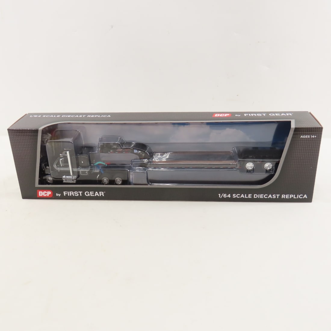 DCP First Gear 1:64 Ford LTL900 Flattop & Lowboy: DCP First Gear 1:64 Ford LTL900 Flattop & Lowboy - Black 60-2102 1/64 Scale Ford LTL-9000 with 60" Flattop Sleeper & Fontaine Magnitude Lowboy Trailer. Lot Size: 16x4x3" 1 lb All information and