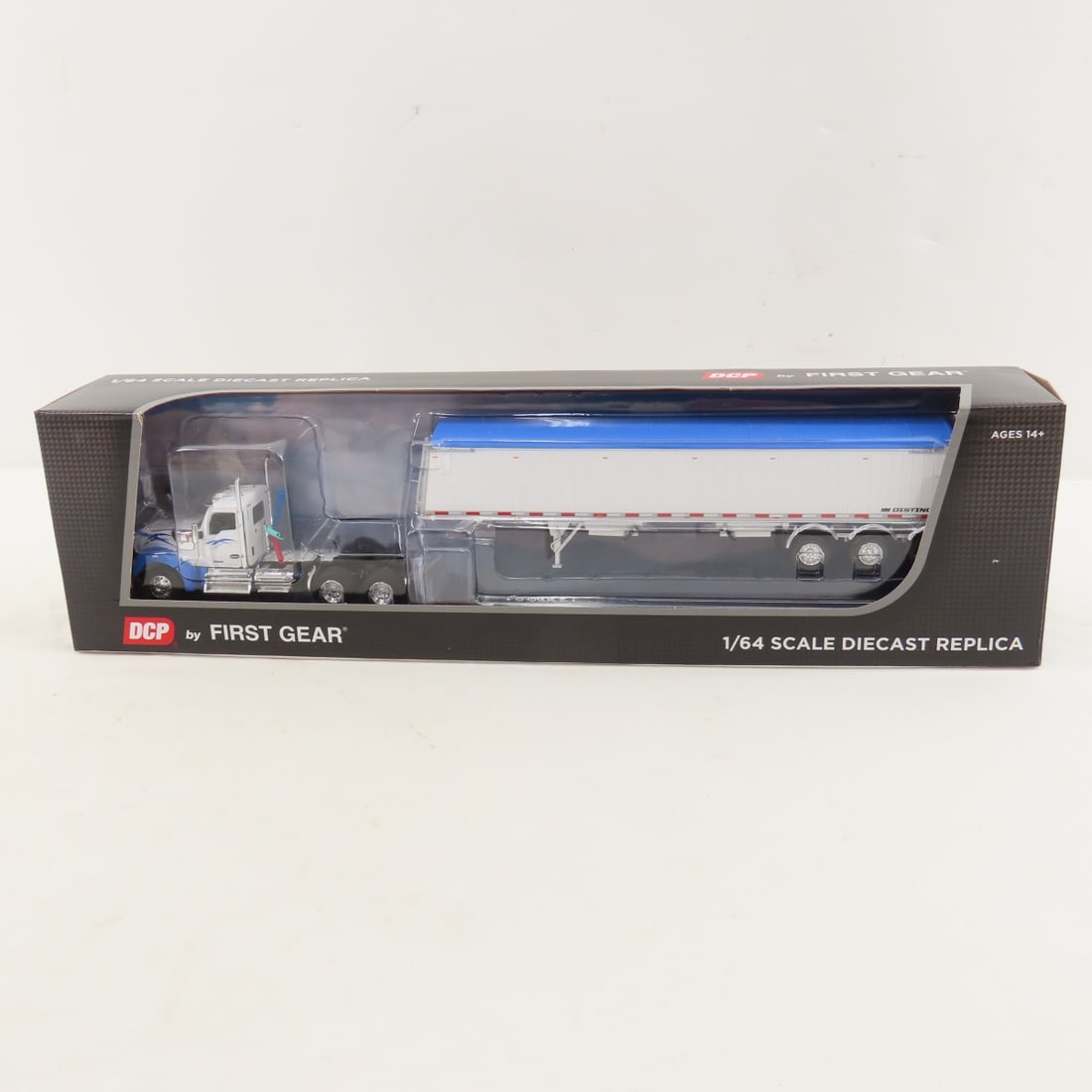 DCP First Gear 1:64 Kenworth W990 Day Cab/Trailer: DCP First Gear 1:64 Kenworth W990 Day Cab/Trailer - White/Blue 60-2177 1/64 Scale Kenworth W990 Day Cab and Lode King Distinction Tri-Axle Hopper Trailer. Lot Size: 16x4x3" 1 lb All information and ph