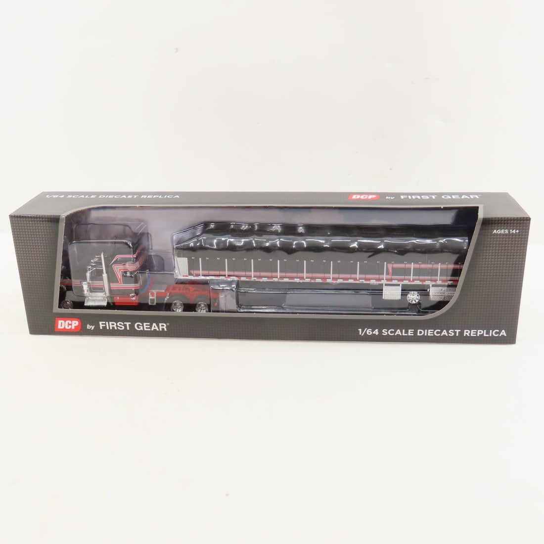 DCP First Gear 1:64 Kenworth Aerodyne Sleeper: DCP First Gear 1:64 Kenworth Aerodyne Sleeper - Black/Red 60-2056 1/64 Scale Kenworth W900A Aerodyne Sleeper w/Whale Tail & Wilson Roadbrute 53' Flatbed Spread Axle Trailer w/Covered Wagon. Lot Size: