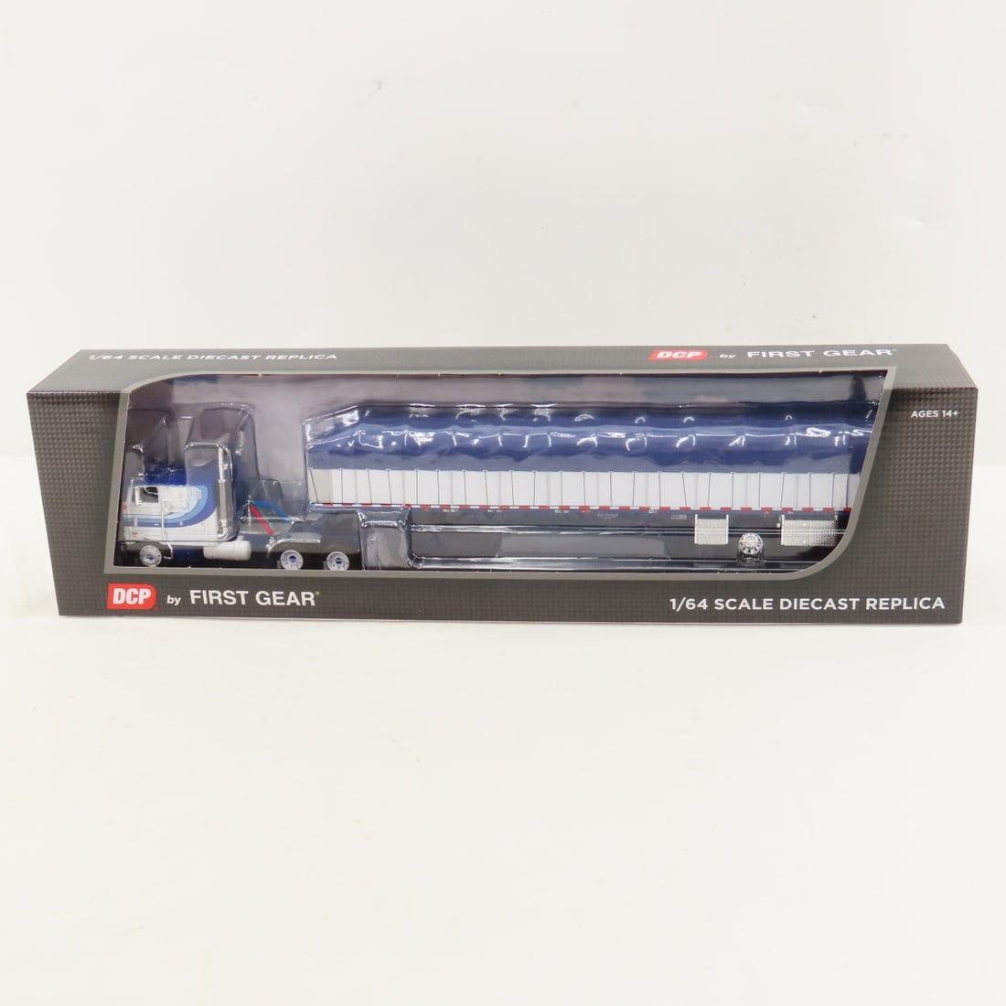 DCP First Gear 1:64 Peterbilt 352 Sleeper/Trailer: DCP First Gear 1:64 Peterbilt 352 Sleeper/Trailer - White/Blue 60-2057 1/64 Scale Peterbilt Model 352 COE 110" Sleeper & Wilson Roadbrute 53' Flatbed Spread Axle Trailer w/Covered Wagon. Lot Size: