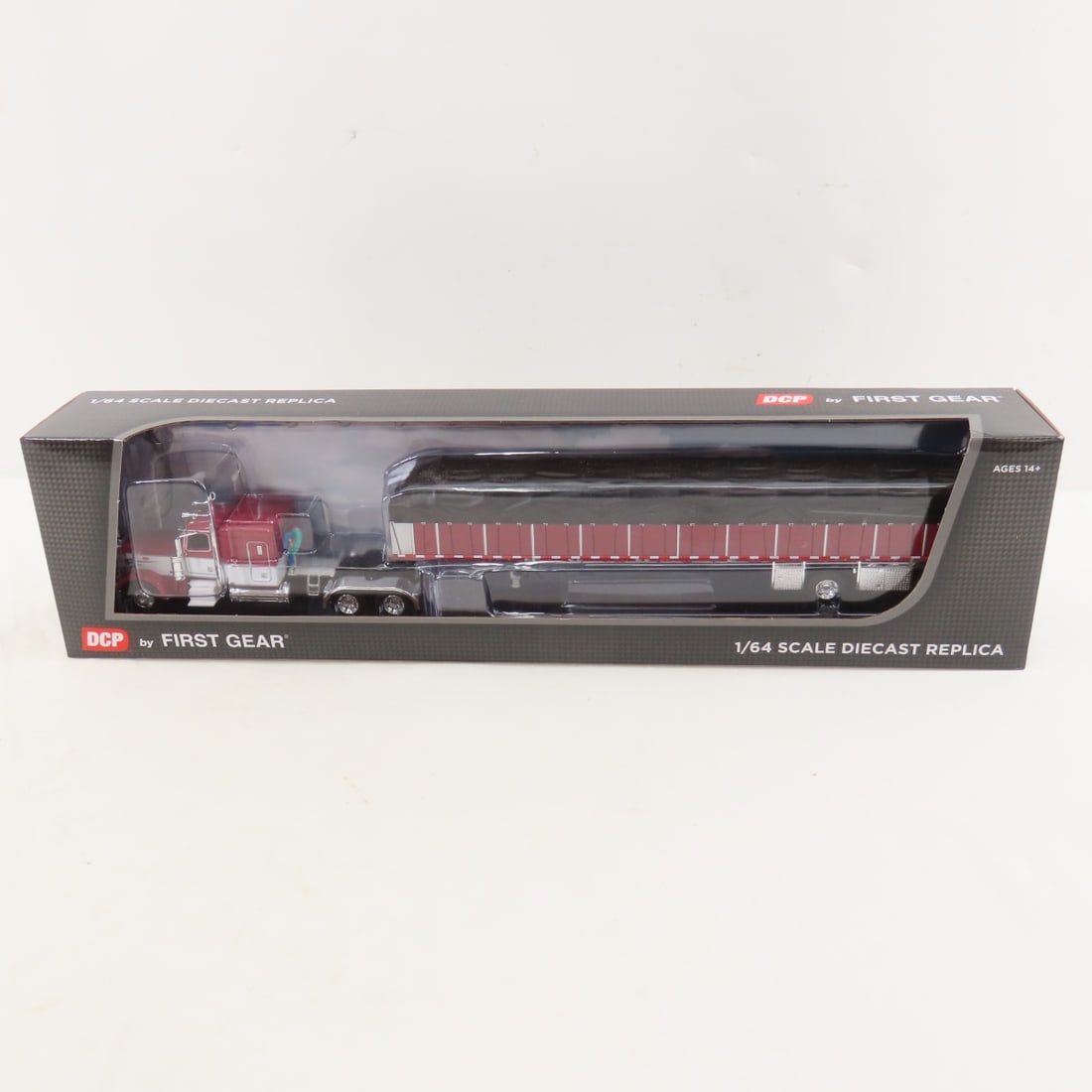 DCP First Gear 1:64 Peterbilt 389 Sleeper/Wagon: DCP First Gear 1:64 Peterbilt 389 Sleeper/Wagon - Maroon/White 60-2058 1/64 Scale Peterbilt Model 389 w/63" Flattop Sleeper Bunk & Wilson Roadbrute 53' Flatbed Spread Axle Trailer w/Covered Wagon.