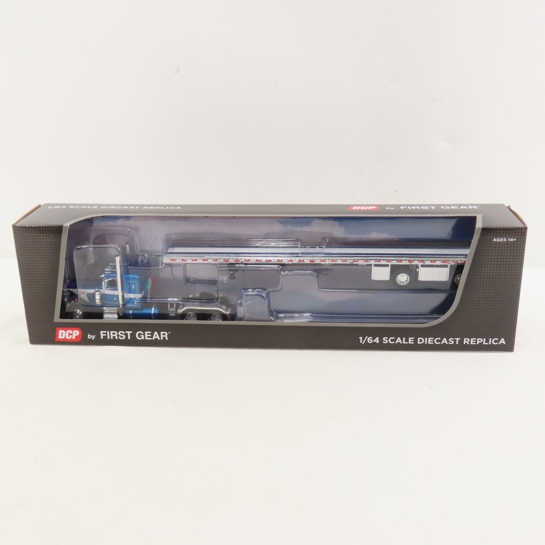 DCP First Gear 1:64 Peterbilt 359 Cab & Roadbrute: DCP First Gear 1:64 Peterbilt 359 Cab & Roadbrute - Blue/Black 60-1621 1/64 Scale Peterbilt 359 w/36" Flattop Sleeper & Wilson Roadbrute 53' Flatbed Spread Axle Trailer. Lot Size: 16x4x3" 1 lb All