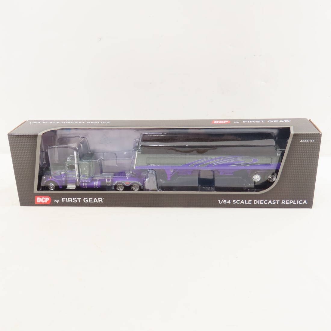 DCP First Gear 1:64 Peterbilt 359 w/Wilson Trailer: DCP First Gear 1:64 Peterbilt 359 w/Wilson Trailer - DD Gray/Purple 60-1421 1/64 Scale Peterbilt 359 36" Flattop Sleeper & Wilson Commander Grain Trailer. Lot Size: 16x4x3" 1 lb All information and ph