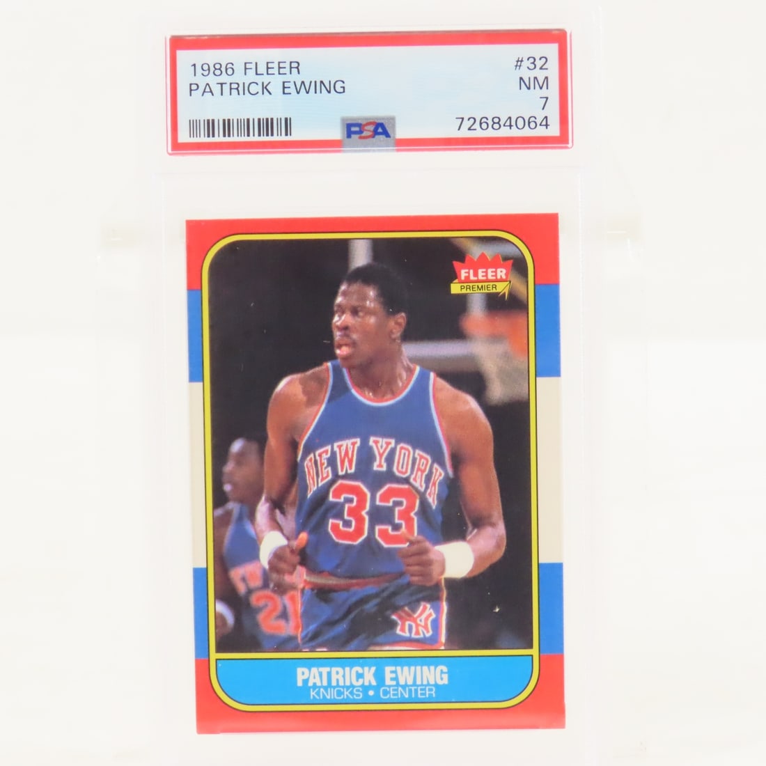 1986 Fleer Patrick Ewing #32 PSA 7 NM Rookie: 1986 Fleer Patrick Ewing #32 PSA 7 NM Rookie - Lot Size 5.5x3.5x.5" 1 LB All information and photos are intended to be as accurate as possible, but errors are possible. No item may be returned or