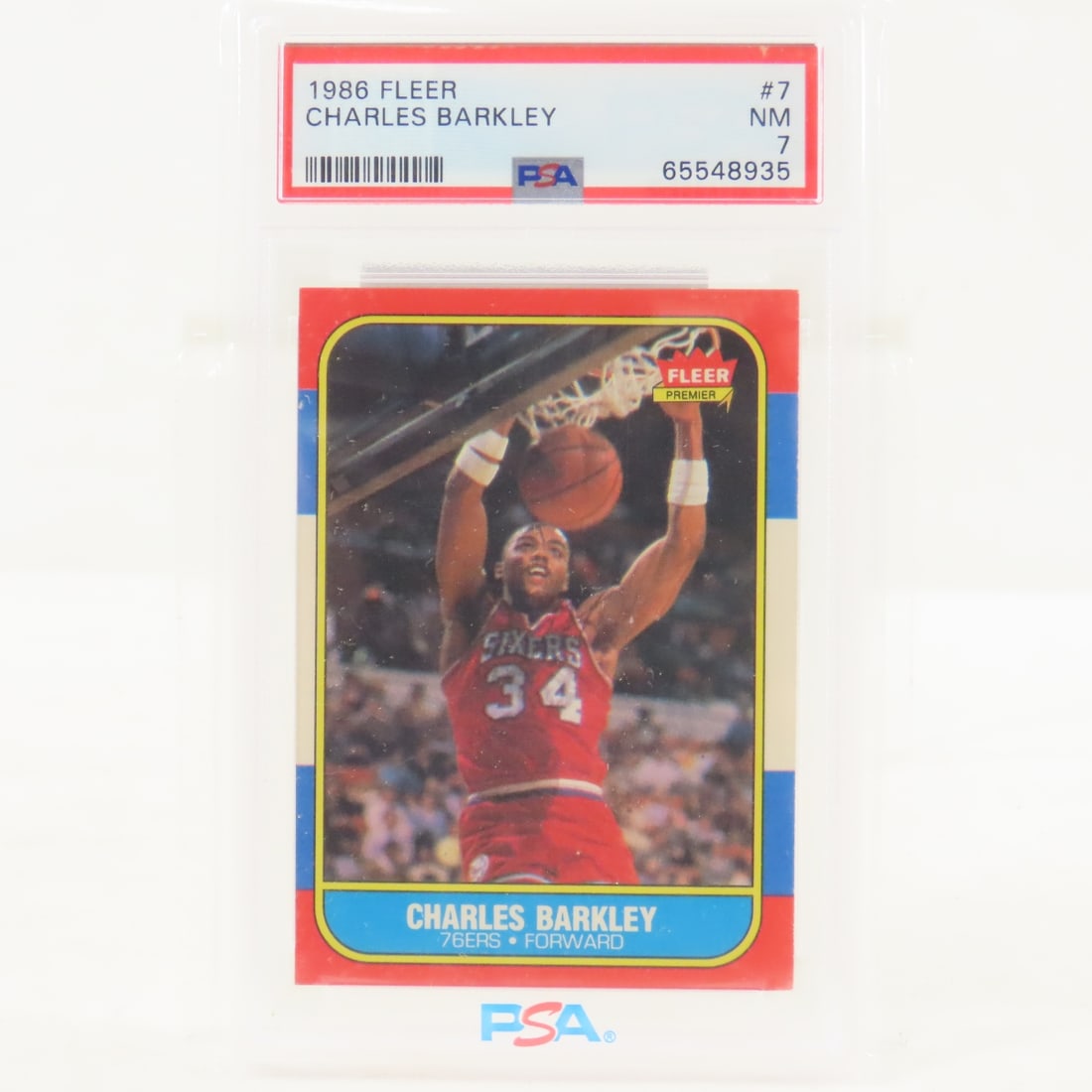 1986 Fleer Charles Barkley #7 PSA 7 NM Rookie: 1986 Fleer Charles Barkley #7 PSA 7 NM Rookie - Lot Size 5.5x3.5x.5" 1 LB All information and photos are intended to be as accurate as possible, but errors are possible. No item may be returned or