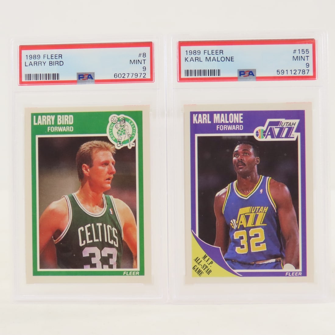 1989 Fleer Larry Bird #8 & Karl Malone #155 PSA 9: 1989 Fleer Larry Bird #8 & Karl Malone #155 PSA 9 - Lot Size 5.5x3.5x.5" 1 LB All information and photos are intended to be as accurate as possible, but errors are possible. No item may be returned