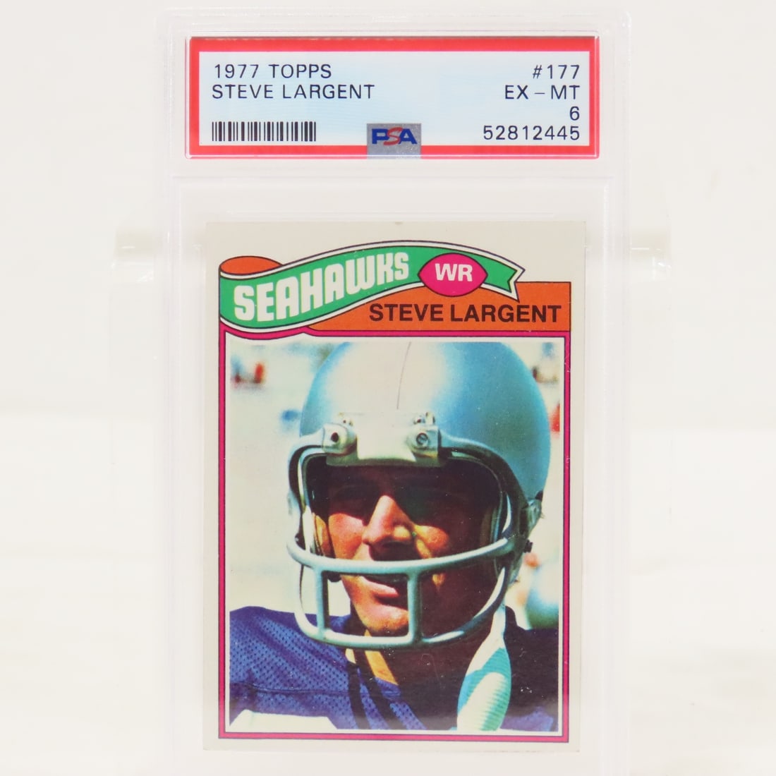 1977 Topps Steve Largent #177 PSA 6 EX-MT Rookie: 1977 Topps Steve Largent #177 PSA 6 EX-MT Rookie - Lot Size 5.5x3.5x.5" 1 LB All information and photos are intended to be as accurate as possible, but errors are possible. No item may be returned or
