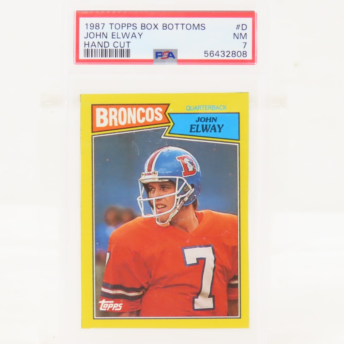 1987 Topps Box Bottoms John Elway #D PSA 7 NM-MT: 1987 Topps Box Bottoms John Elway #D PSA 7 NM-MT - Lot Size 5.5x3.5x.5" 1 LB All information and photos are intended to be as accurate as possible, but errors are possible. No item may be returned or 