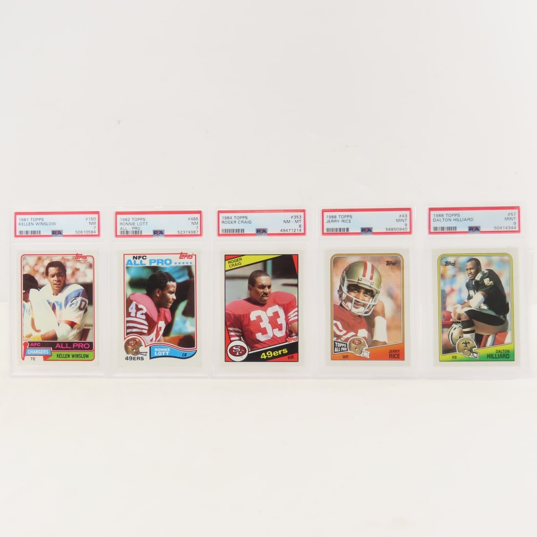 5 PSA Graded 1980's Football Star Cards: 5 PSA Graded 1980's Football Star Cards - 1988 Topps Dalton Hilliard #57 PSA 9 Mint, 1988 Topps Jerry Rice #43 PSA 9 Mint, 1984 Topps Roger Craig #353 PSA 8 NM-MT, 1982 Topps Ronnie Lott #486 PSA 7