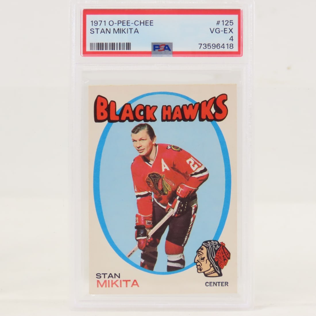 1971 O-PEE-CHEE Stan Mikita #125 PSA 4 VG-EX: 1971 O-PEE-CHEE Stan Mikita #125 PSA 4 VG-EX - Lot Size 5.5x3.5x.5" 1 LB All information and photos are intended to be as accurate as possible, but errors are possible. No item may be returned or