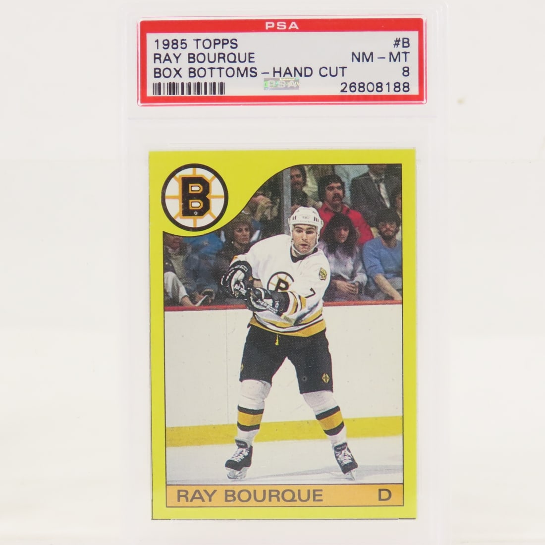 1985 Topps Box Bottoms Ray Bourque #B PSA 8 NM-MT: 1985 Topps Box Bottoms Ray Bourque #B PSA 8 NM-MT - Lot Size 5.5x3.5x.5" 1 LB All information and photos are intended to be as accurate as possible, but errors are possible. No item may be returned