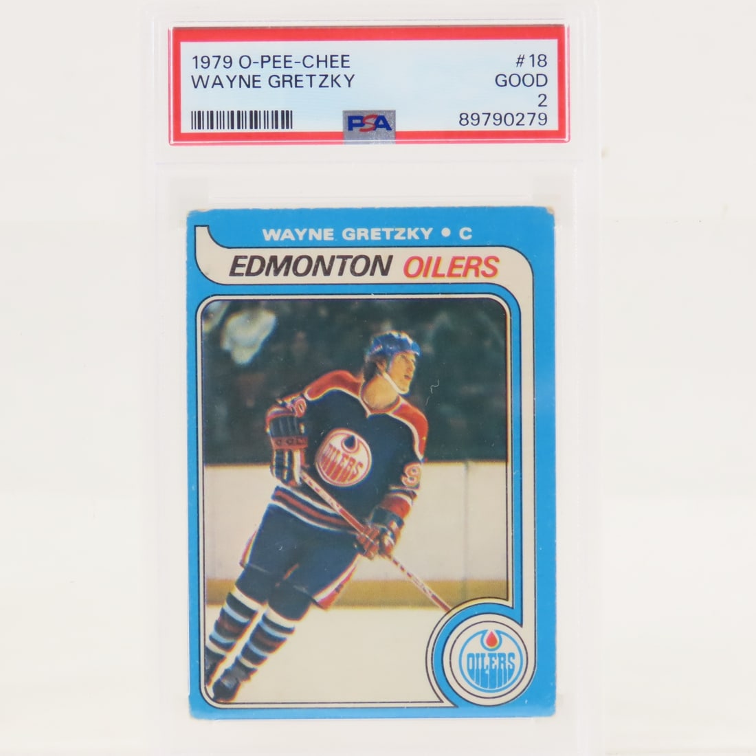 1979 O-PEE-CHEE Wayne Gretzky #18 PSA 2 Good: 1979 O-PEE-CHEE Wayne Gretzky #18 PSA 2 Good - Lot Size 5.5x3.5x.5" 1 LB All information and photos are intended to be as accurate as possible, but errors are possible. No item may be returned or