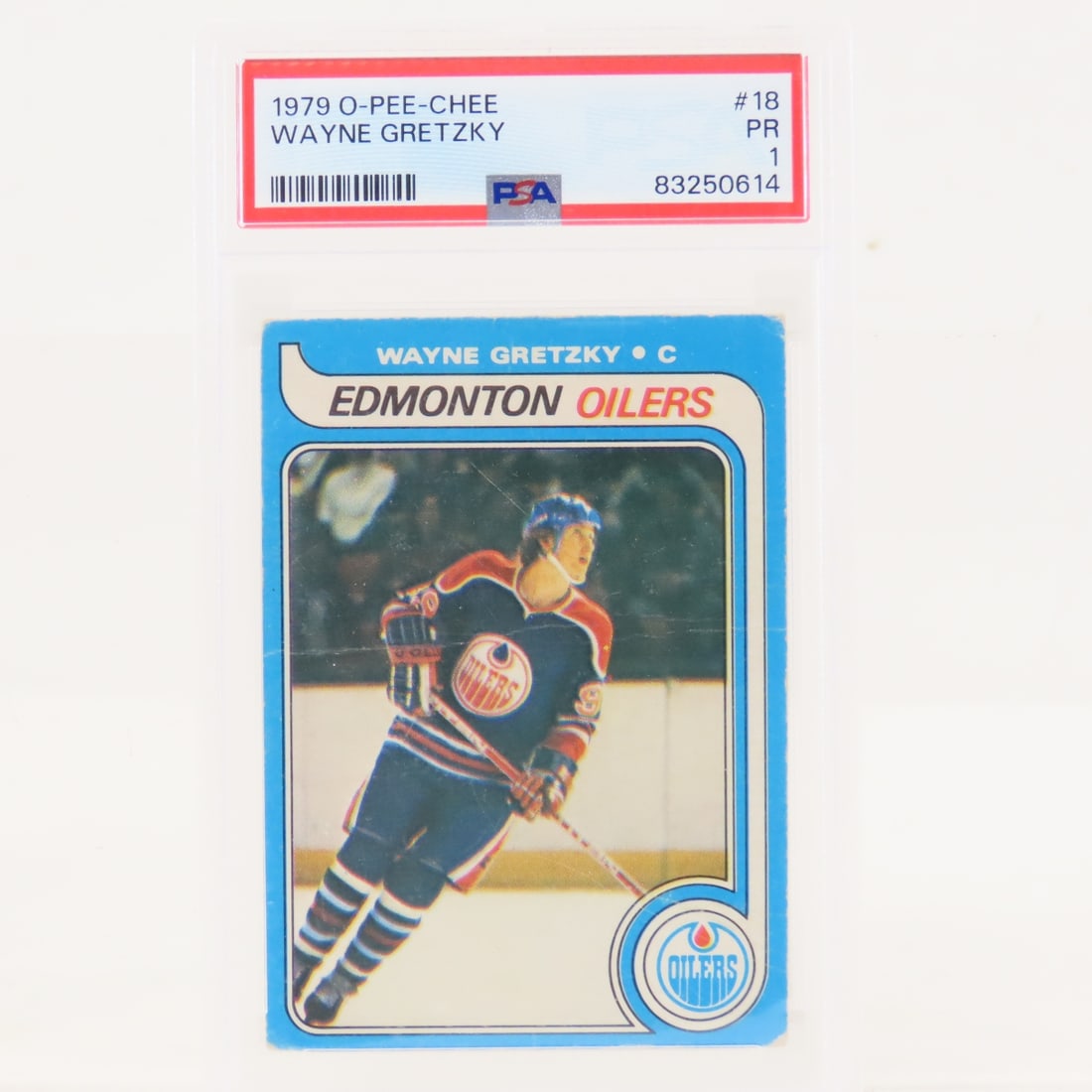 1979 O-PEE-CHEE Wayne Gretzky #18 PSA 1 PR: 1979 O-PEE-CHEE Wayne Gretzky #18 PSA 1 PR - Lot Size 5.5x3.5x.5" 1 LB All information and photos are intended to be as accurate as possible, but errors are possible. No item may be returned or refuse