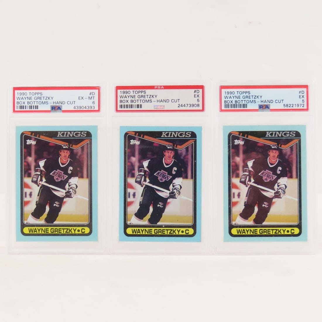 3 PSA 5&6 1990 Topps Box Bottoms Wayne Gretzky #D: 3 PSA 5&6 1990 Topps Box Bottoms Wayne Gretzky #D - Lot Size 5.5x3.5x.2" 1 LB All information and photos are intended to be as accurate as possible, but errors are possible. No item may be returned or