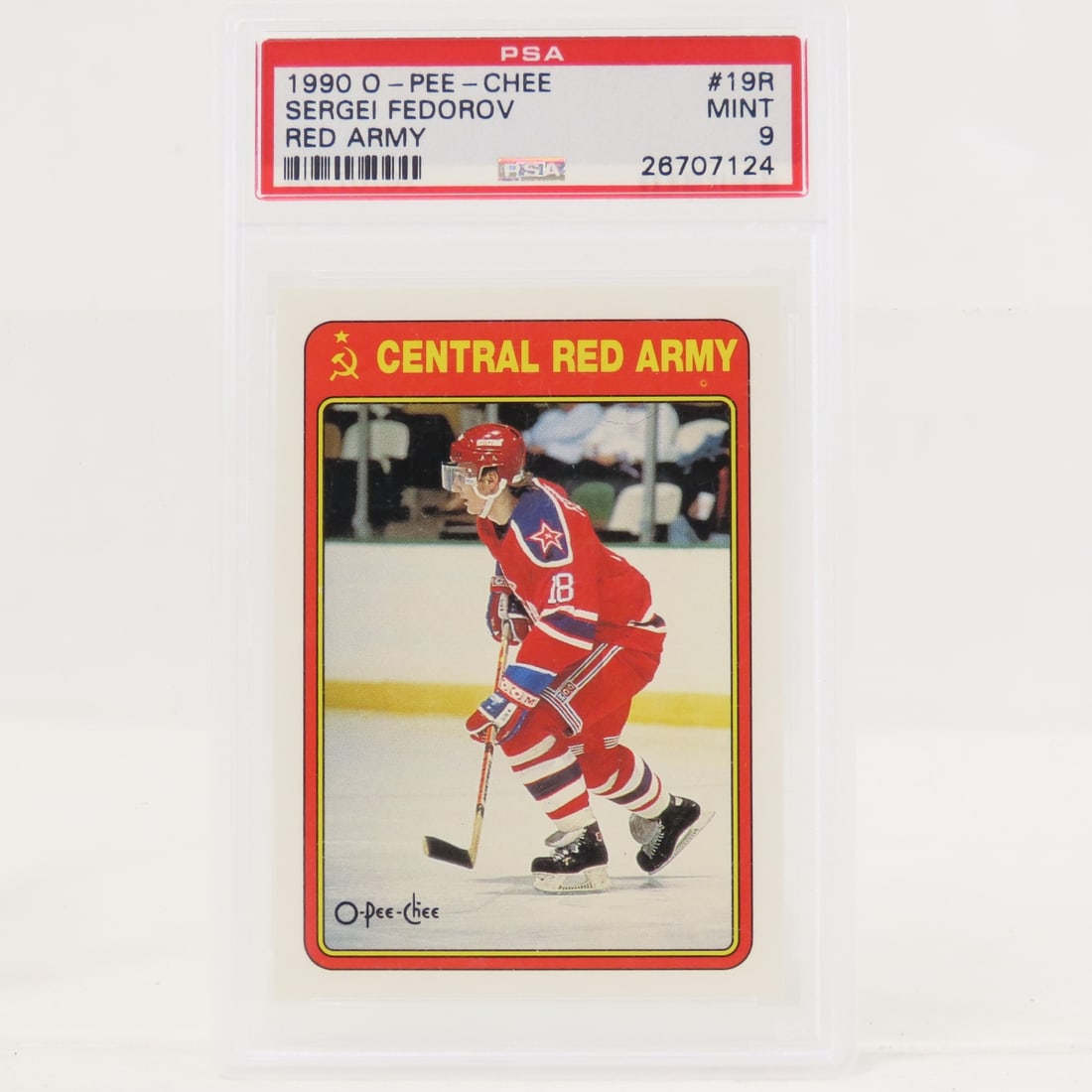 1990 O-PEE-CHEE Sergei Fedorov Red Army #19R PSA 9: 1990 O-PEE-CHEE Sergei Fedorov Red Army #19R PSA 9 - Lot Size 5.5x3.5x1" 1 LB All information and photos are intended to be as accurate as possible, but errors are possible. No item may be returned or