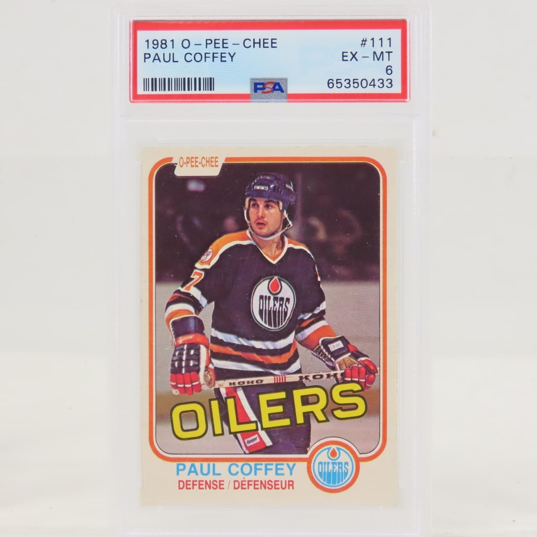 1981 O-PEE-CHEE Paul Coffey #111 PSA 6 EX-MT RC: 1981 O-PEE-CHEE Paul Coffey #111 PSA 6 EX-MT RC - Lot Size 5.5x3.5x1" 1 LB All information and photos are intended to be as accurate as possible, but errors are possible. No item may be returned or re