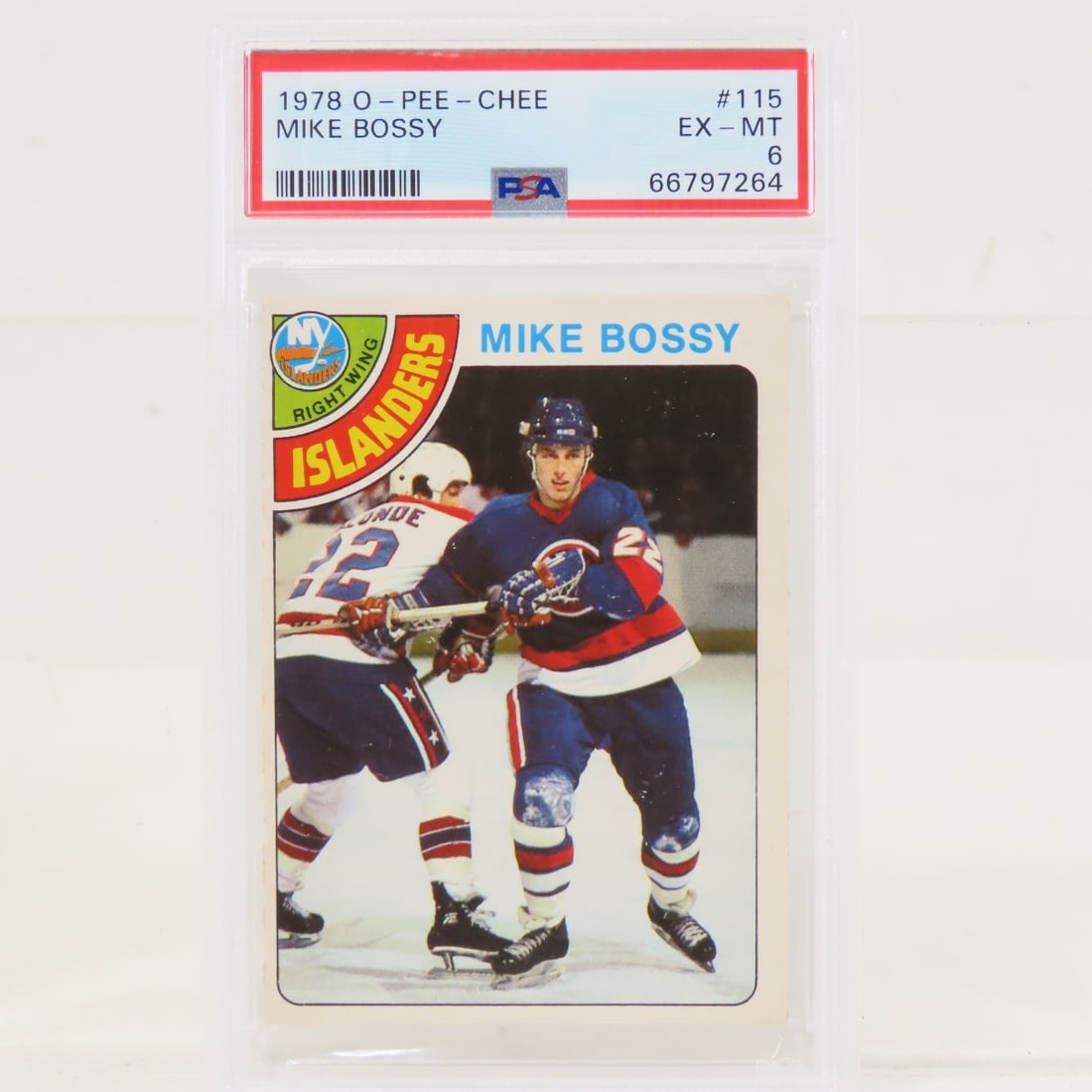 1978 O-PEE-CHEE Mike Bossy #115 PSA 6 EX-MT RC: 1978 O-PEE-CHEE Mike Bossy #115 PSA 6 EX-MT RC - Lot Size 5.5x3.5x1" 1 LB All information and photos are intended to be as accurate as possible, but errors are possible. No item may be returned or ref