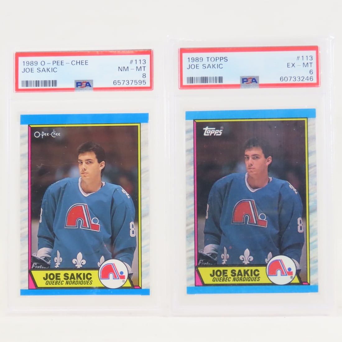 1989 O-PEE-CHEE Joe Sakic #113 PSA 8 & Topps PSA 6: 1989 O-PEE-CHEE Joe Sakic #113 PSA 8 & Topps PSA 6 - Rookie Lot Size 5.5x3.5x1" 1 LB All information and photos are intended to be as accurate as possible, but errors are possible. No item may be