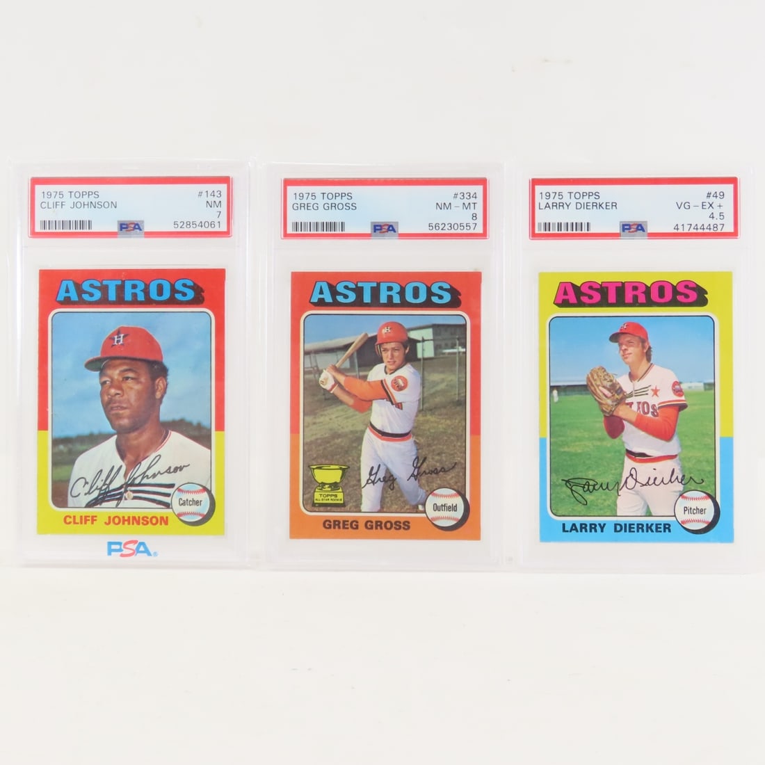 3 1975 Topps Astros PSA graded Baseball Cards: 3 1975 Topps Astros PSA graded Baseball Cards - 1975 Topps Gregg Gross #334 PSA 8 NM-MT Rookie, 1975 Topps Cliff Johnson #143 PSA 7 NM Rookie, 1975 Larry Dierker #49 PSA 4.5 VG-EX+. Lot Size 6x4x2" 1