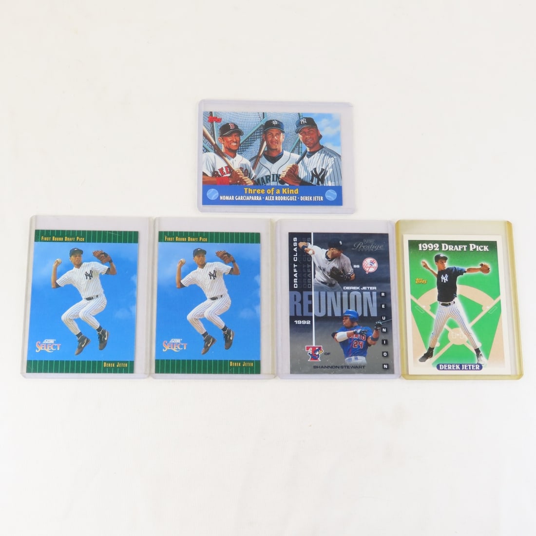 3 Derek Jeter Rookie Baseball Cards & more: 3 Derek Jeter Rookie Baseball Cards & more - Lot Size 4x3x3" 1 LB All information and photos are intended to be as accurate as possible, but errors are possible. No item may be returned or refused