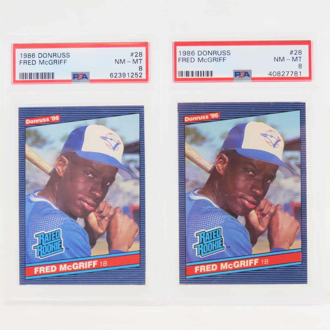 2 1986 Donruss Fred McGriff #28 Rookie PSA 8 NM-MT: 2 1986 Donruss Fred McGriff #28 Rookie PSA 8 NM-MT - Lot Size 5.5x3.5x2" 1 LB All information and photos are intended to be as accurate as possible, but errors are possible. No item may be returned
