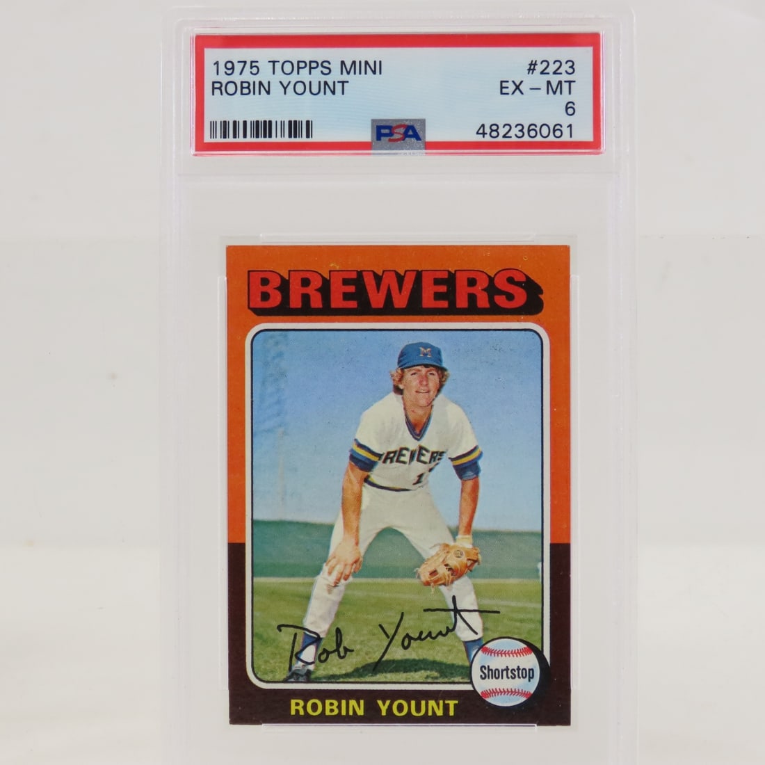 1975 Topps Mini Robin Yount #223 PSA 6 EX-MT: 1975 Topps Mini Robin Yount #223 PSA 6 EX-MT - Lot Size 5.5x3.5x1" 1 LB All information and photos are intended to be as accurate as possible, but errors are possible. No item may be returned or refus