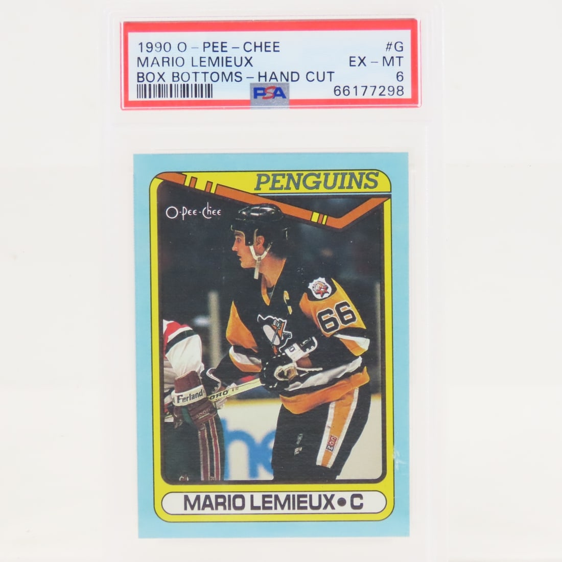 1990 O-PEE-CHEE Box Bottoms Mario Lemieux #G PSA 6: 1990 O-PEE-CHEE Box Bottoms Mario Lemieux #G PSA 6 - Lot Size 5.5x3.5x1" 1 LB All information and photos are intended to be as accurate as possible, but errors are possible. No item may be returned or