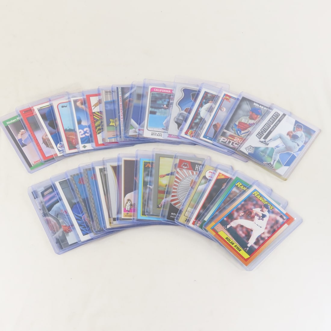 30 Mixed Nolan Ryan Baseball Cards: 30 Mixed Nolan Ryan Baseball Cards - All cards in plastic cases. Lot Size 4x4x3" 1 LB All information and photos are intended to be as accurate as possible, but errors are possible. No item may be ret