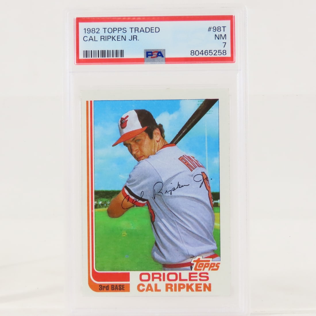 1982 Topps Traded Cal Ripken Jr #98T PSA 7 NM: 1982 Topps Traded Cal Ripken Jr #98T PSA 7 NM - Lot Size 5.5x3.5x1" 1 LB All information and photos are intended to be as accurate as possible, but errors are possible. No item may be returned or