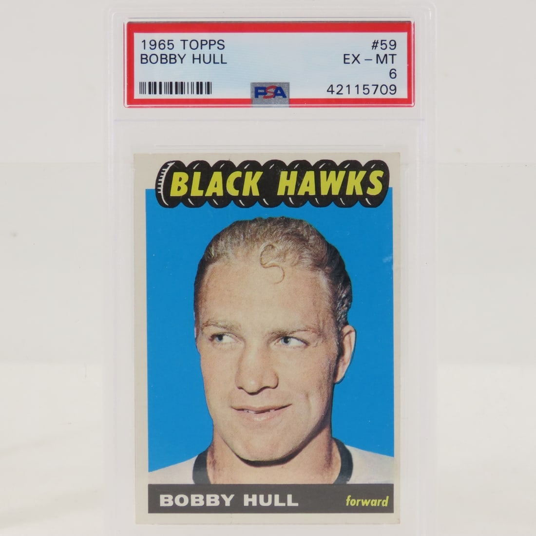 1965 Topps Bobby Hull #59 PSA 6 EX-MT: 1965 Topps Bobby Hull #59 PSA 6 EX-MT - Lot Size 5.5x3.5x1" 1 LB All information and photos are intended to be as accurate as possible, but errors are possible. No item may be returned or refused base