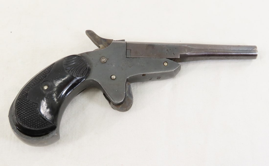 Spanish Ermua Model 1928 .22 Pocket Pistol: Spanish Ermua Model 1928 .22 Pocket Pistol - SN#E314 on frame & barrel, 2.75" part round barrel, tip-up, synthetic grips, exposed hammer, several proof marks, C&R or FFL transfer required, please