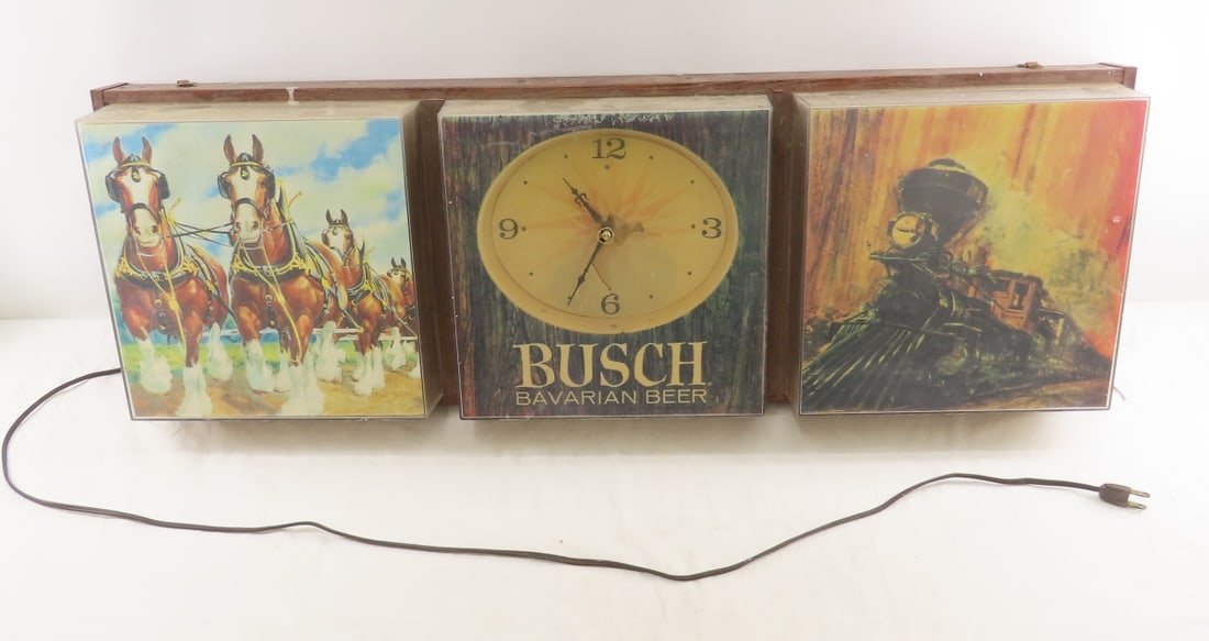 Vintage Busch Beer Lighted Clock: Vintage Busch Beer Lighted Clock - Clock runs but clock face is heavily damaged - looks fairly simple to replace. Measures approx 37x12x5" Lights not working, needs new bulbs and a good cleaning. LOT 