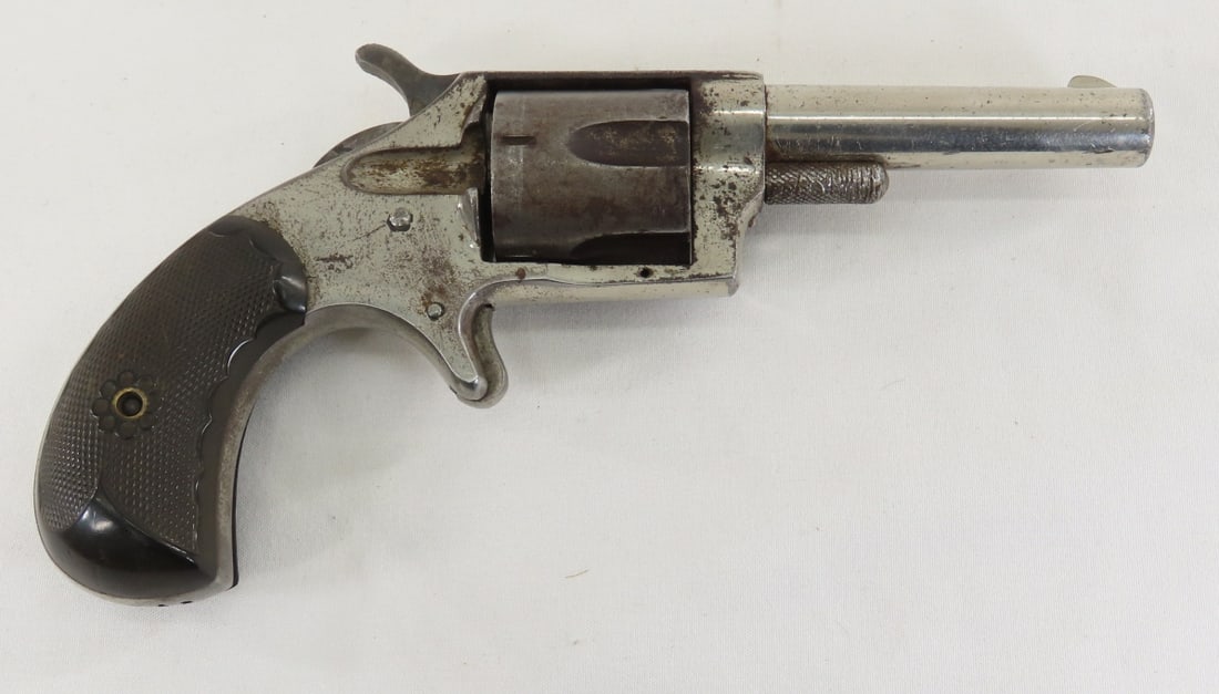 Robin Hood No. 2 .32 RF Revolver: Robin Hood No. 2 .32 RF Revolver - Antique, SN# 8727, SA, 5 shot, free spinning cylinder, 2.75" barrel marked "PAT APRIL 6 1875", spur trigger, birds head grips- 1 is cracked, front blade and groove