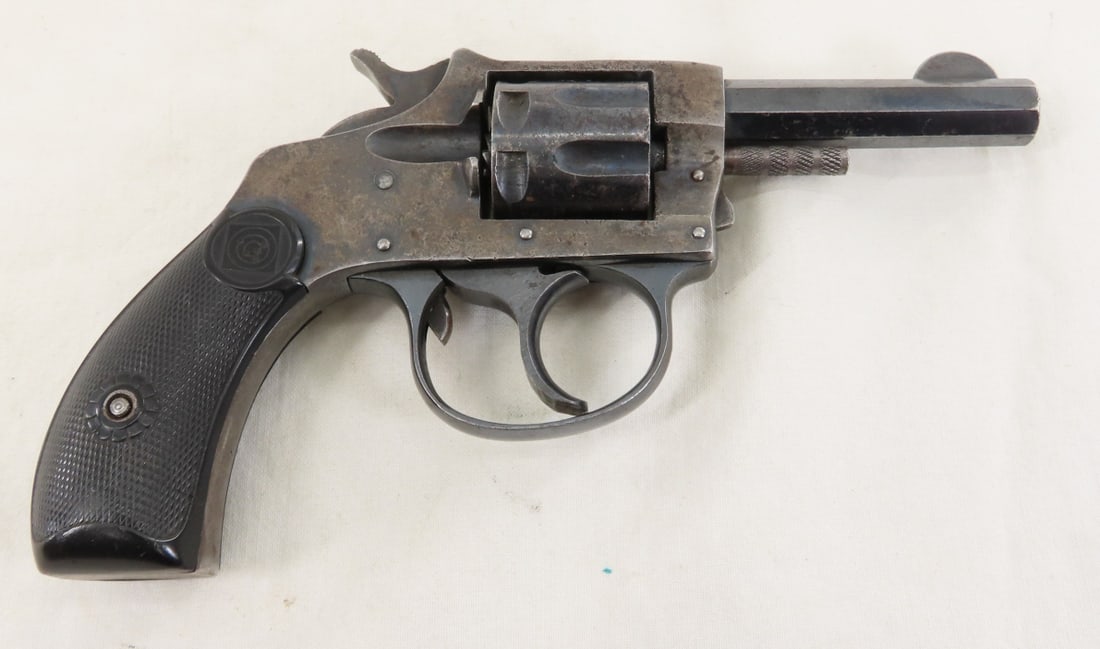 Harrington & Richardson 1906 .22 RF Revolver: Harrington & Richardson 1906 .22 RF Revolver - SN# 87275 under grips, 7 shot, 2.5" octagon barrel with front blade sight, exposed hammer, checkered synthetic target grips, Mfg 1905-1941, C&R or FFL