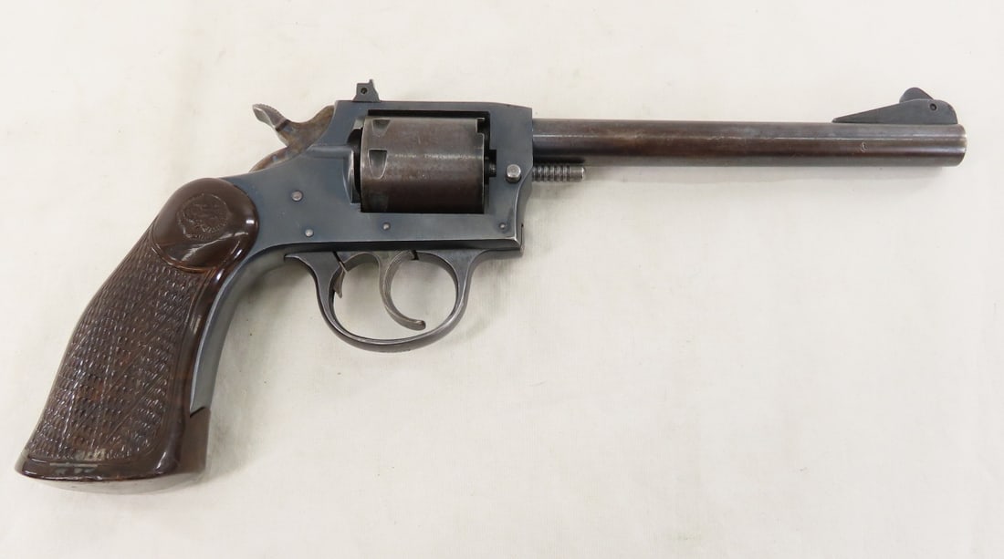 Iver Johnson Model 57A Target .22 LR Revolver: Iver Johnson Model 57A Target .22 LR Revolver - Sportsman Deluxe SN# D16196, 6" barrel with adjustable front & rear sights, 8 shot, exposed hammer, molded one piece synthetic grip with owl on right si