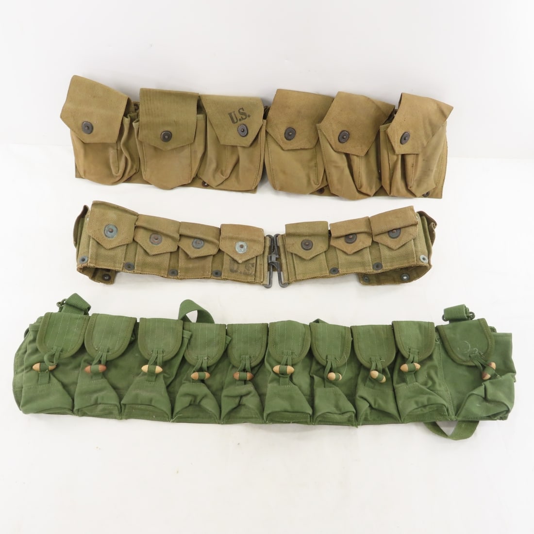 2 US WWII & 1 Vietcong Military Ammo Belts: 2 US WWII & 1 Vietcong Military Ammo Belts - LOT SIZE: 15x10x4" 3 LBS All information and photos, which are part of the description) are intended to be as accurate as possible, but errors are possible