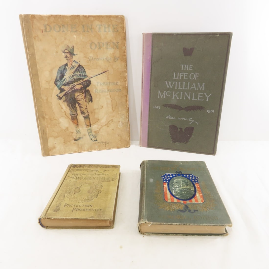 4 Antique Hardcover Books- Remington, McKinley: 4 Antique Hardcover Books- Remington, McKinley - Done In The Open Drawings By Frederic Remington 1902- Large Hardcover 16x12", The Life of William McKinley copyright 1901 by P.F. Collier & Son, The