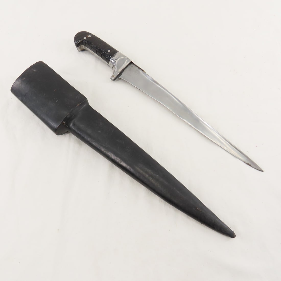 Afghan Kyber Knife with Sheath: Afghan Kyber Knife with Sheath - 11" blade, 16" OAL, with wood and leather sheath. unmarked. LOT SIZE: 18x4x3" 2 LBS All information and photos, which are part of the description) are intended to be