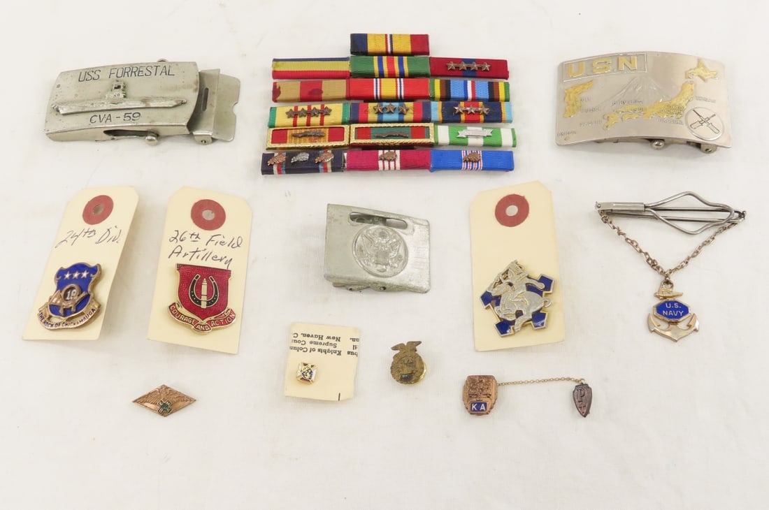 US Medal Bar with 16 awards, USN, USS Forrestal: US Medal Bar with 16 awards, USN, USS Forrestal - CVA-59 buckle, misc insignia. LOT SIZE: 4x4x4" 1 LB All information and photos, which are part of the description) are intended to be as accurate as