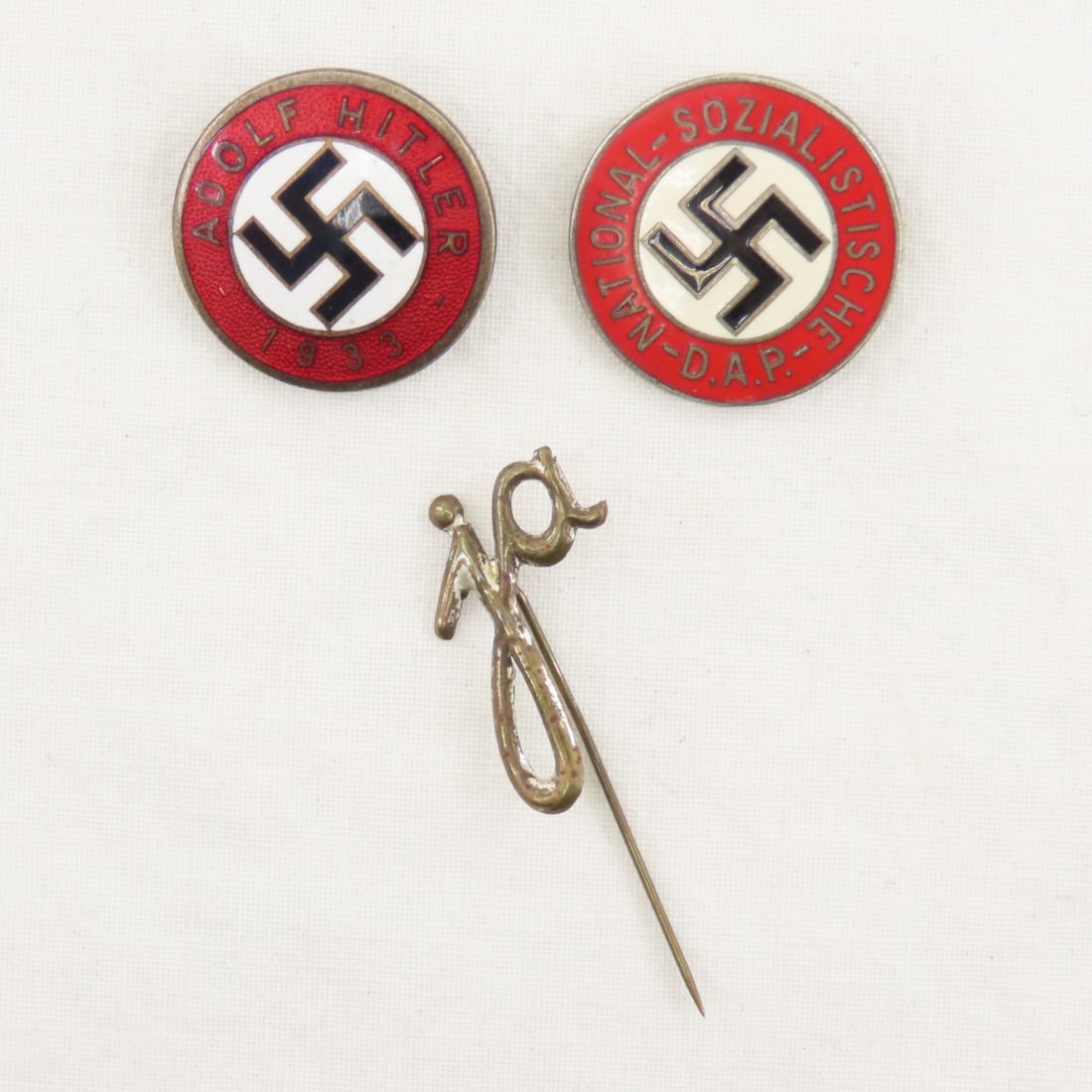 WWII German Adolf Hitler 1933 & NSDAP Enamel Pins: WWII German Adolf Hitler 1933 & NSDAP Enamel Pins - And NSDAP ja stick pin. LOT SIZE: 3x3x3" 1 LB All information and photos, which are part of the description) are intended to be as accurate as possi