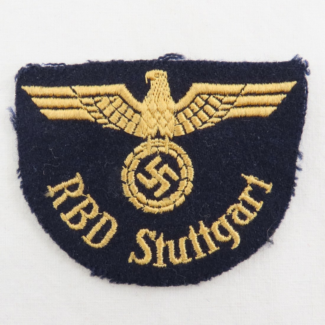 WWII German Reichsbahn Stuttgard Division Patch: WWII German Reichsbahn Stuttgard Division Patch - Sleeve Patch. LOT SIZE: 3x3x3" 1 LB All information and photos, which are part of the description) are intended to be as accurate as possible, but